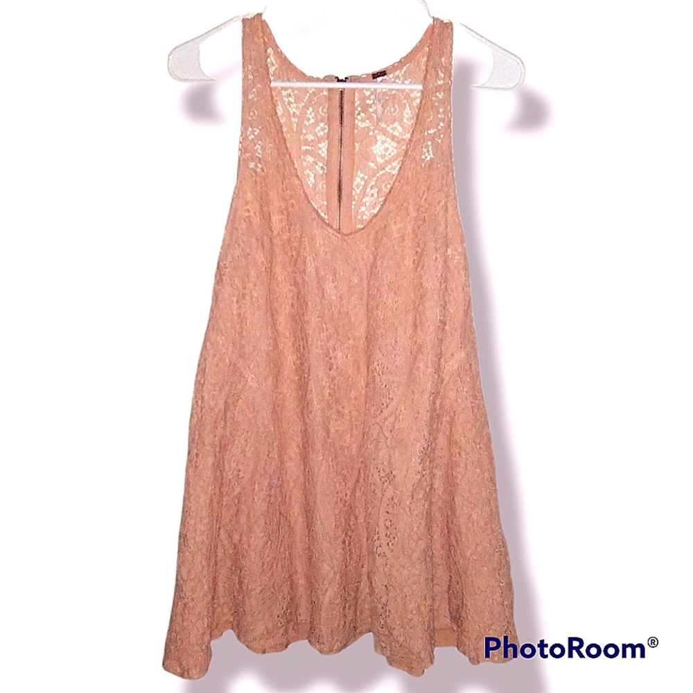 Free people blouses short sleeve peach color size s zips in back